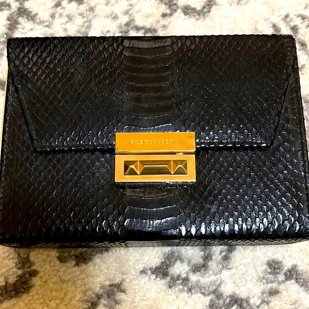 BCBG Black snakeskin clutch